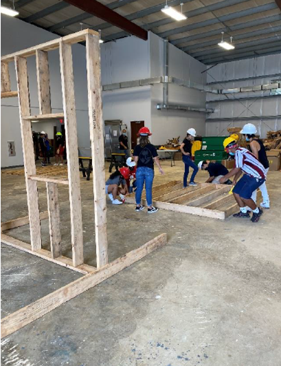 Students at the GCA Trades Academy learn to frame a wall.