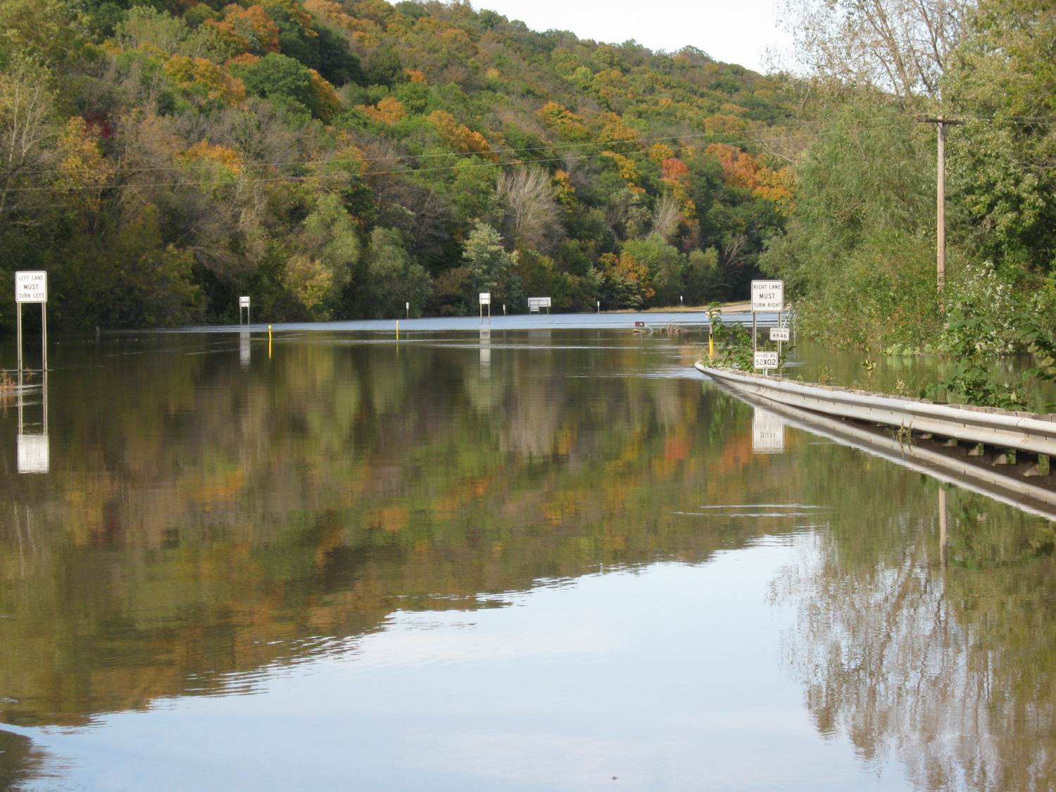 Images of the flooding and damage caused by floods on Highway 169 in Minnesota