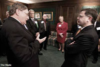 January 26, 2011 - Assistant Secretary Fernandez talks with University of Toledo's President Lloyd Jacobs, during the Toledo MACOG general assembly. (THE BLADE/JEREMY WADSWORTH)