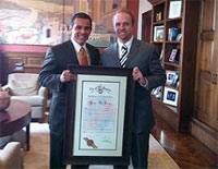 December 9, 2010 - Deputy Assistant Secretary McGowan receives a Certificate of Commendation from Los Angeles Mayor Villaraigosa during his visit to L.A. for the EDA Seattle Regional Conference.