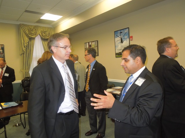 Nish Acharya, Director of the Office of Innovation and Entrepreneurship talks with Rich Lunak, President and CEO of Innovation Works (2010 i6 Challenge Winner).