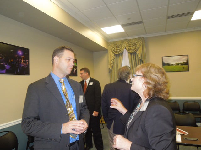 Kathy Hansen, COO of the Arrowhead Center at New Mexico State University (2012 i6 Challenge Winner) talks with Andrew Wilson, Executive Director of the New England Clean Energy Foundation (2011 i6 Challenge Winner)