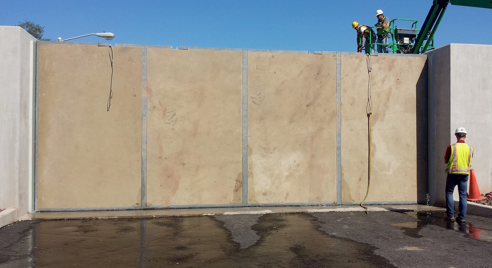 Construction workers finishing the floodgate