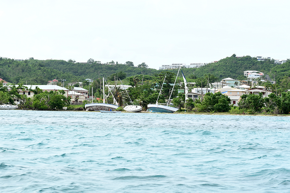Damaged boats in the U.S. Virgin Islands during 2017 hurricanes on shore in Long Reef - FEMA News Photo