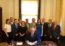 Photo 5 - Gov of MS proclaims National Econ Dev Week Caption below