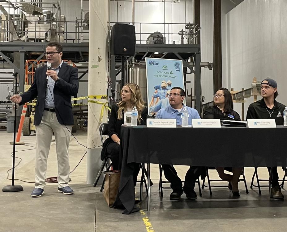 Photo of Fresno EDC Executive Director (Will Oliver) as he shares insights from the Good Jobs 4 the Central Valley GJC project with manufacturers and community partners at the Manufacturing CoP convening in August 2023. 