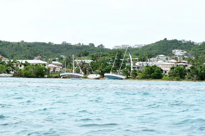 Damaged boats in the U.S. Virgin Islands during 2017 hurricanes on shore in Long Reef - FEMA News Photo