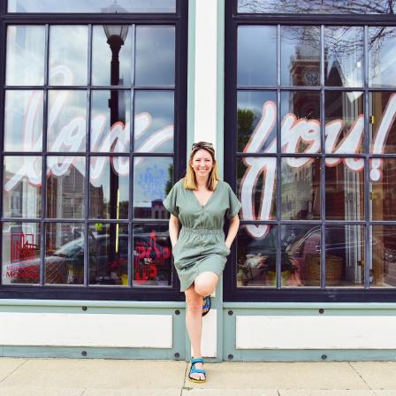 Debbie Hillary stands outside her business, Busy Bee Floral in Monroe, Wisconsin