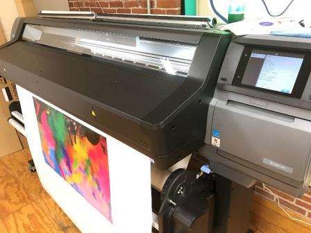 A business loan made through an EDA-capitalized RLF allowed The Flag Loft to purchase a necessary HP Latex 570 printer