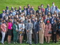 ACE Colorado delegates and organizers during the opening ceremony at Denver Botanical Gardens.