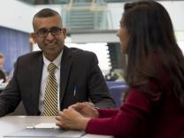 Digital Forensics Chair Sanjay Goel with University of Albany student