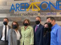 Photo of AS Castillo and Graves with ArepaZone DC staff